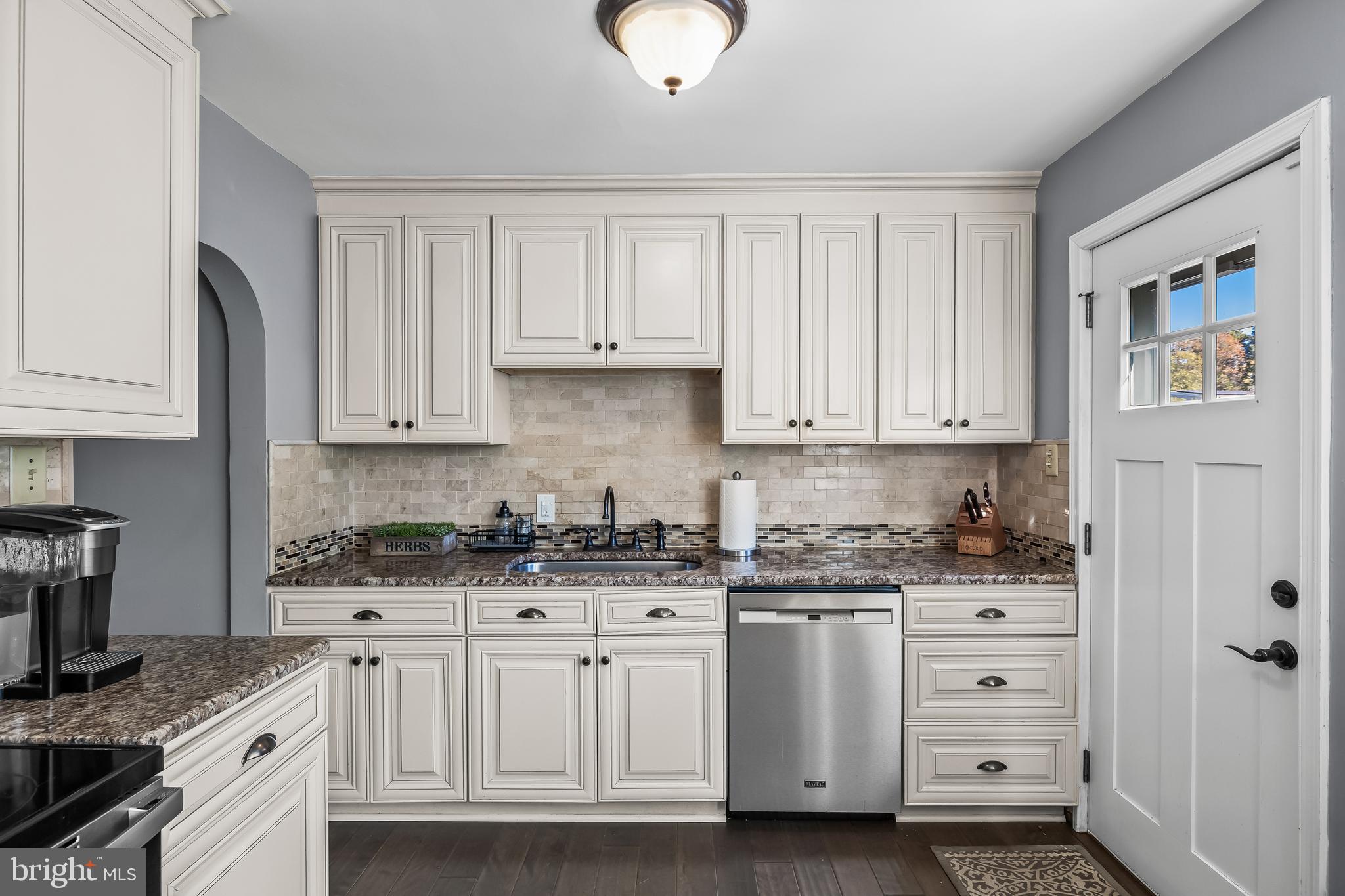 531 Covington Terrace Moorestown, NJ 08057 - Photo 14 of 35 a kitchen with stainless steel appliances granite countertop a sink and cabinets