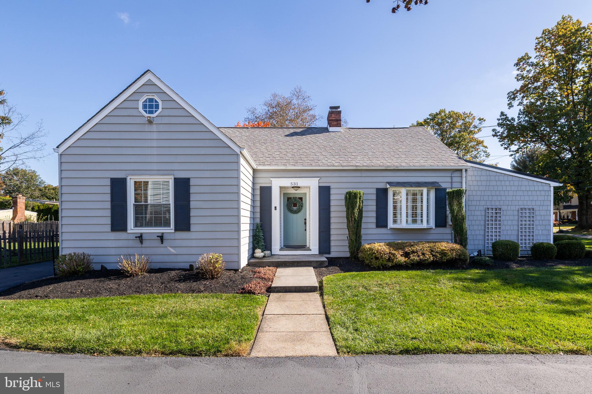 531 Covington Terrace Moorestown, NJ 08057 - Photo 2 of 35 a front view of a house with a yard and potted plants