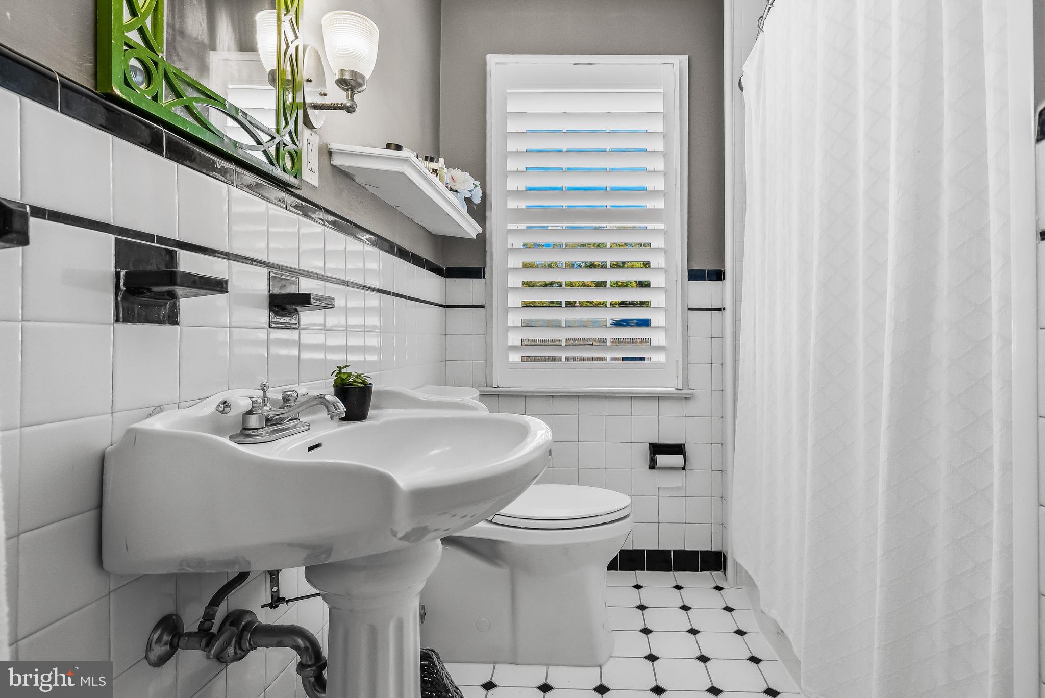 531 Covington Terrace Moorestown, NJ 08057 - Photo 21 of 35 a bathroom with a sink toilet and a mirror