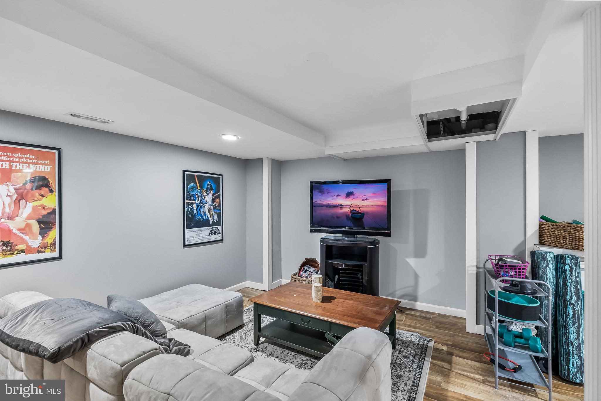 531 Covington Terrace Moorestown, NJ 08057 - Photo 29 of 35 a living room with furniture and a flat screen tv