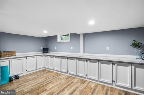 a view of a kitchen with electric appliances