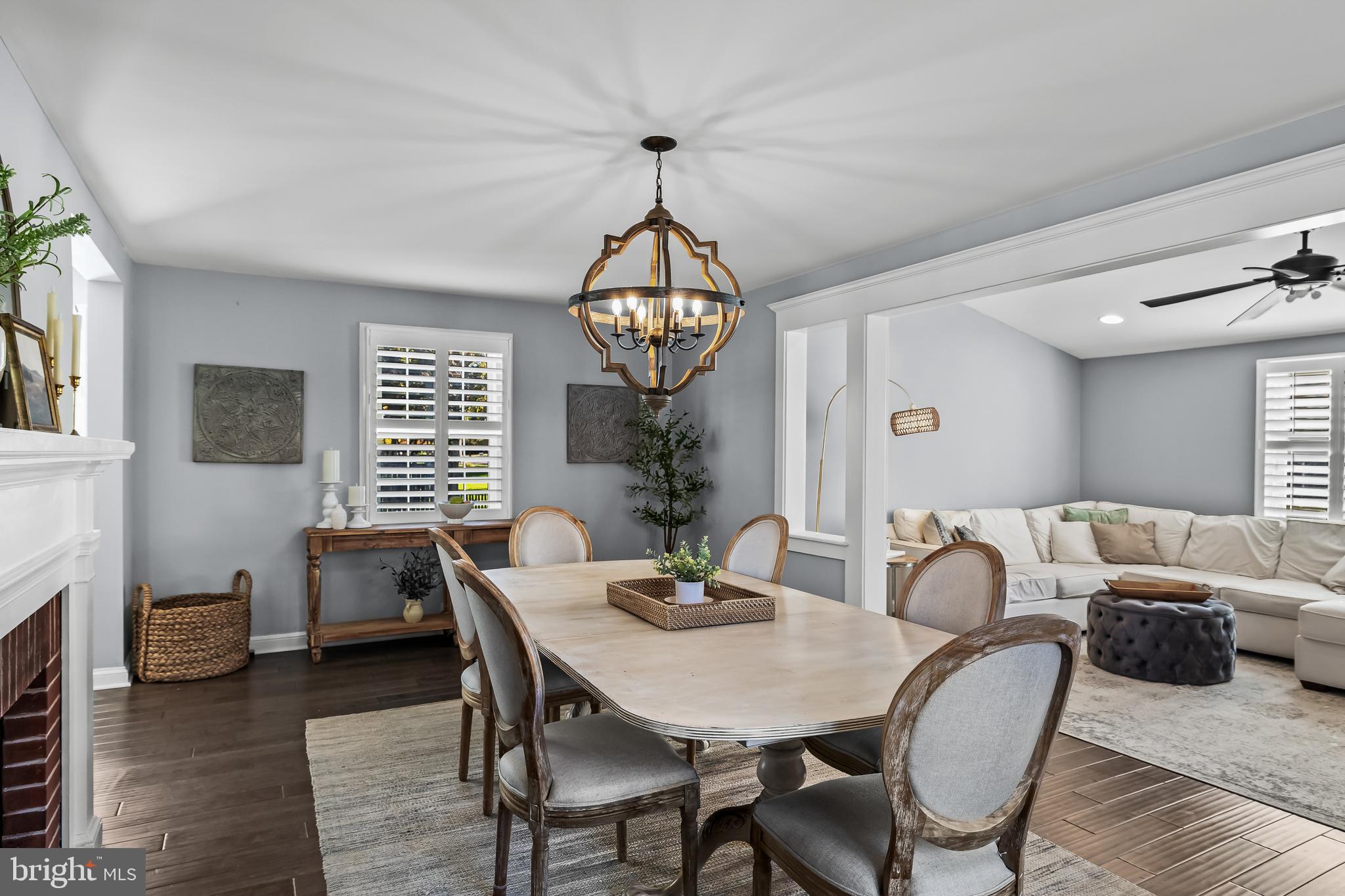 531 Covington Terrace Moorestown, NJ 08057 - Photo 6 of 35 a dining room with furniture a chandelier and wooden floor