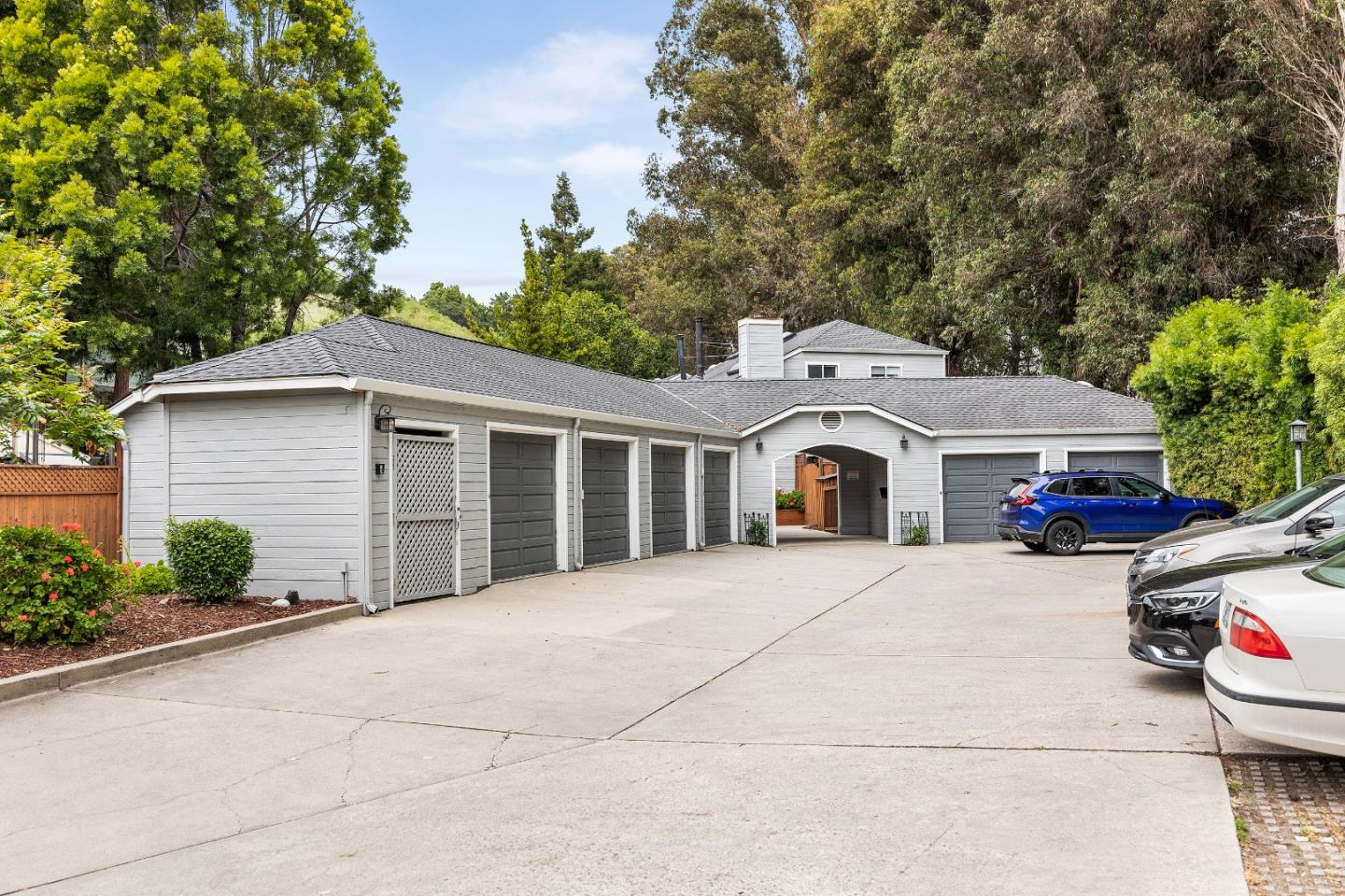 1644 Ocean Street Santa Cruz, CA 95060 - Photo 48 of 60 a front view of a house with a yard and garage