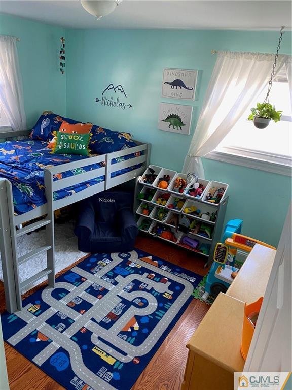200 New Dover Road Colonia, NJ 07067 - Photo 8 of 14 a bedroom with a bed and a window