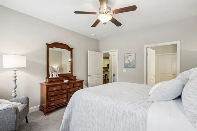 a bathroom with double vanity sinks and a mirror