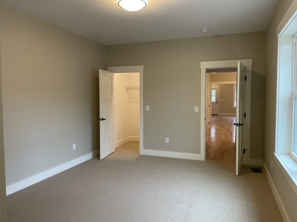 3 Powell Street, Unit B Devens, MA 01434 - Photo 11 of 28 an empty room with closet area