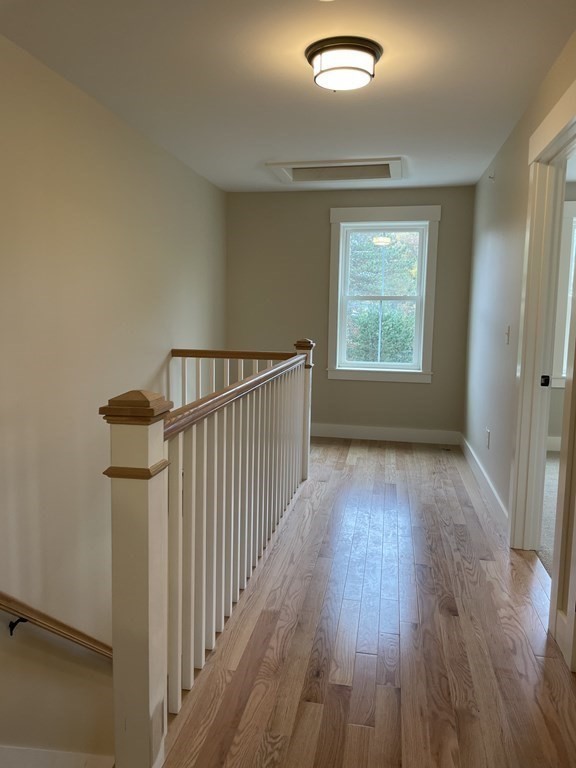 3 Powell Street, Unit B Devens, MA 01434 - Photo 16 of 28 wooden floor in an empty room with a window