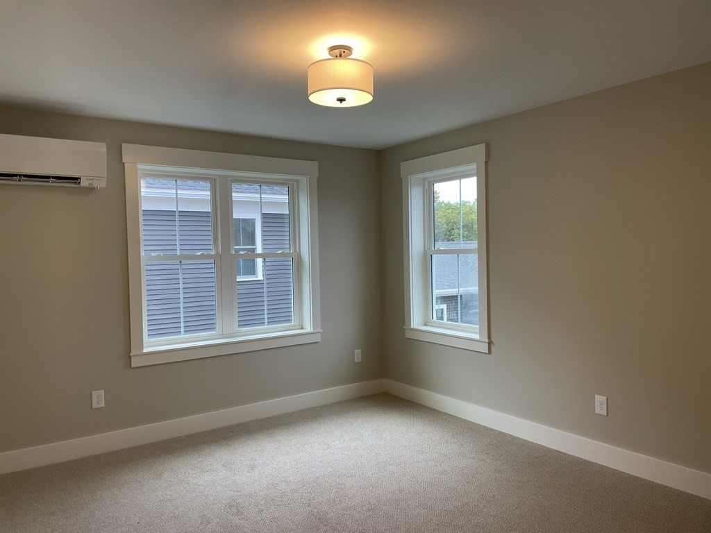 3 Powell Street, Unit B Devens, MA 01434 - Photo 17 of 28 a view of an empty room with a window