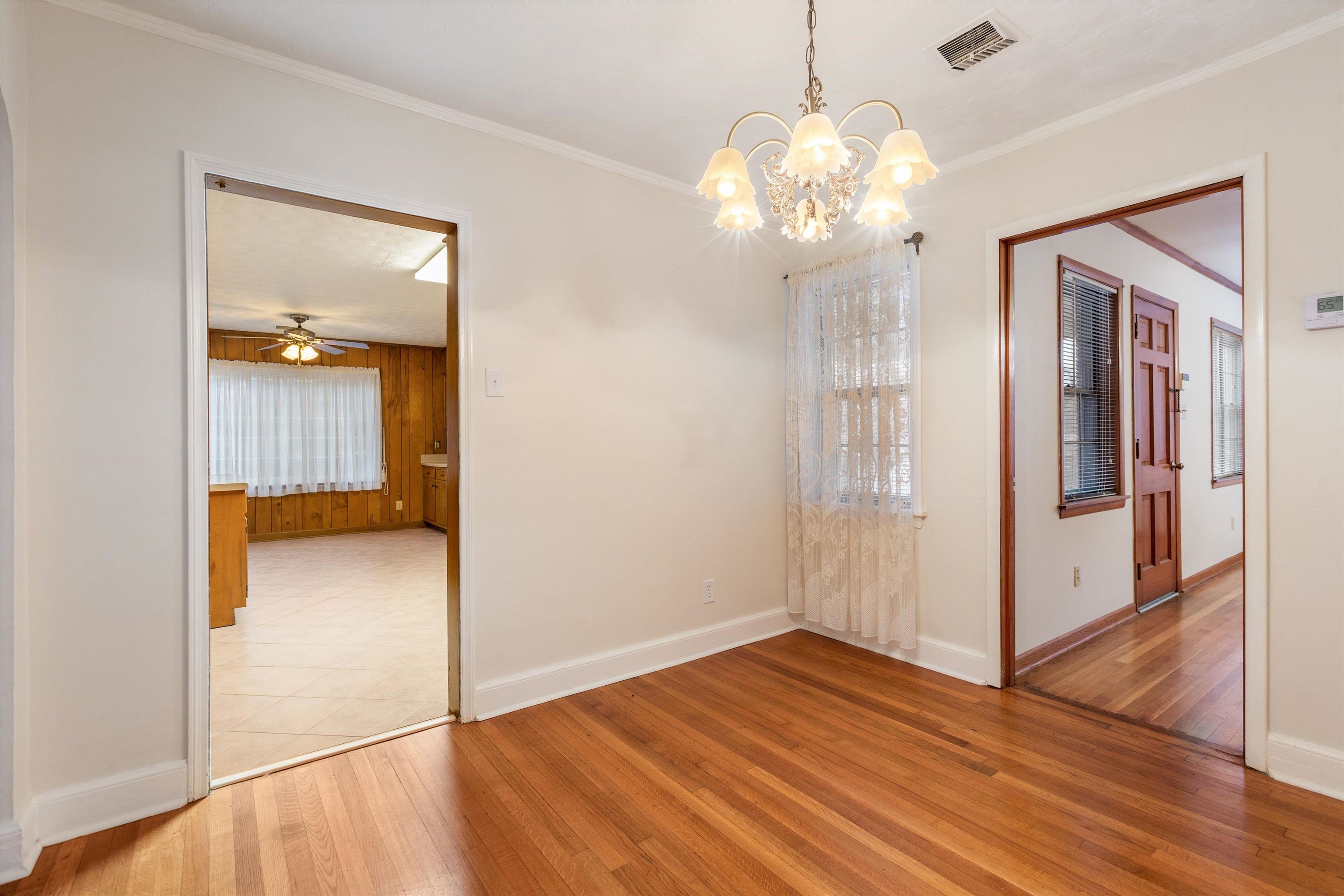 1217 Vaughn Road Memphis, TN 38122 - Photo 15 of 27 a view of an empty room with wooden floor