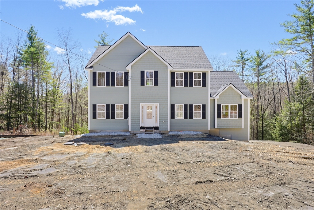 112 West Meadow Road Townsend, MA 01474 - Photo 31 of 38 a front view of a house with a yard