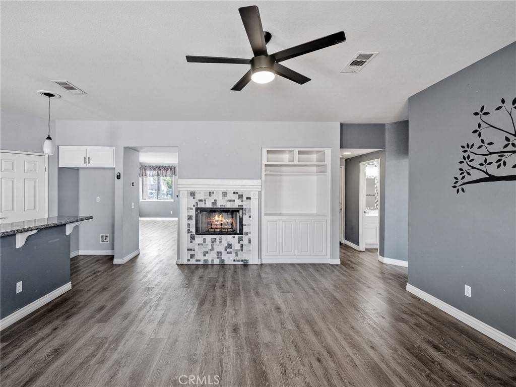 8923 Azalea Springs Road Oak Hills, CA 92344 - Photo 18 of 46 Newer Block Vinyl Wood Flooring