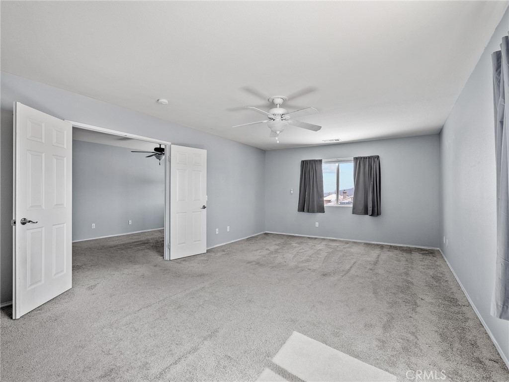 8923 Azalea Springs Road Oak Hills, CA 92344 - Photo 25 of 46 Large Primary Bedroom