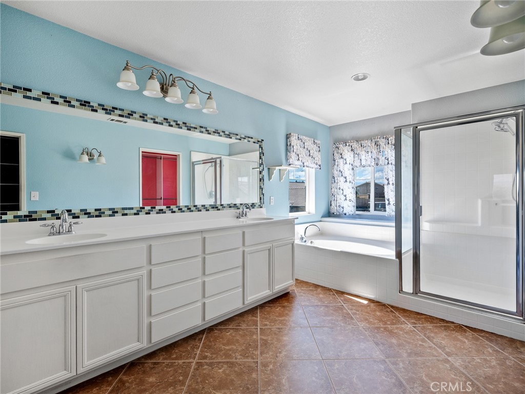 8923 Azalea Springs Road Oak Hills, CA 92344 - Photo 27 of 46 Primary Bath