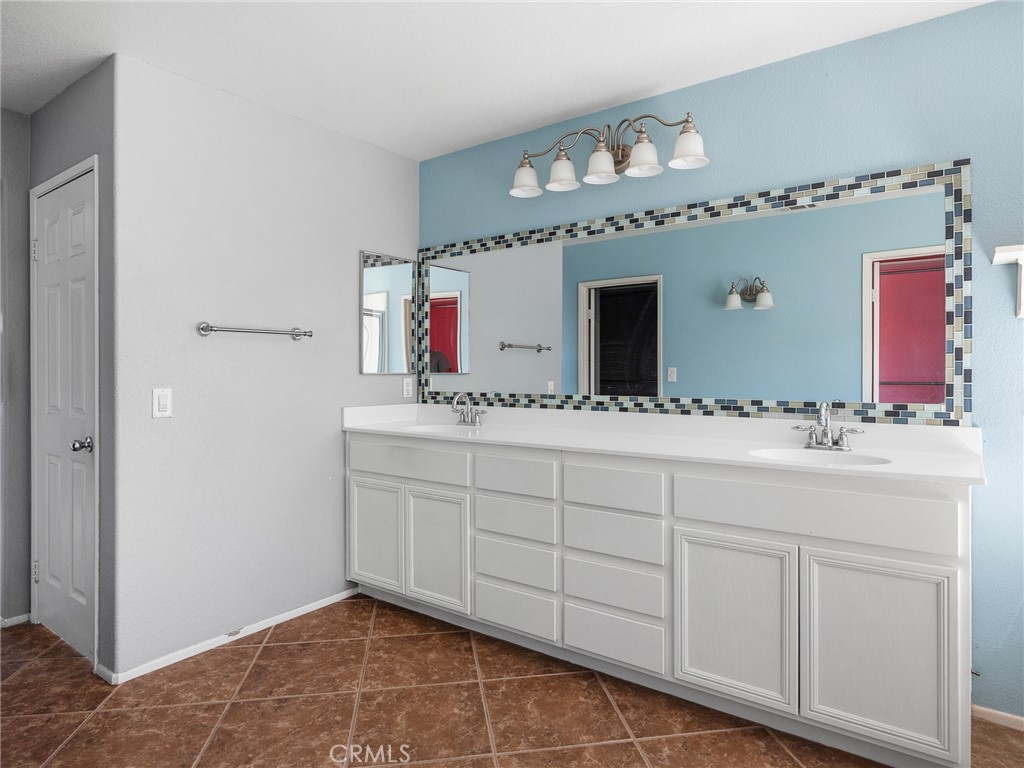 8923 Azalea Springs Road Oak Hills, CA 92344 - Photo 29 of 46 Primary Bath with Double Sinks