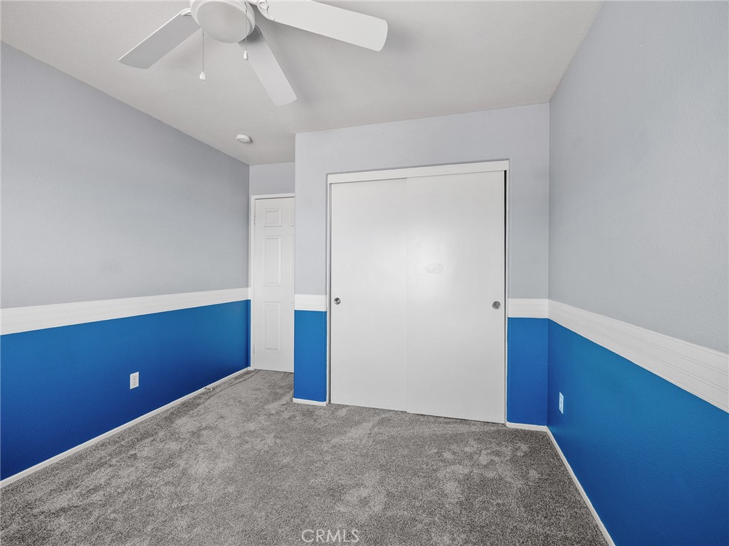 8923 Azalea Springs Road Oak Hills, CA 92344 - Photo 33 of 46 Bedroom 3 with Ceiling Fan