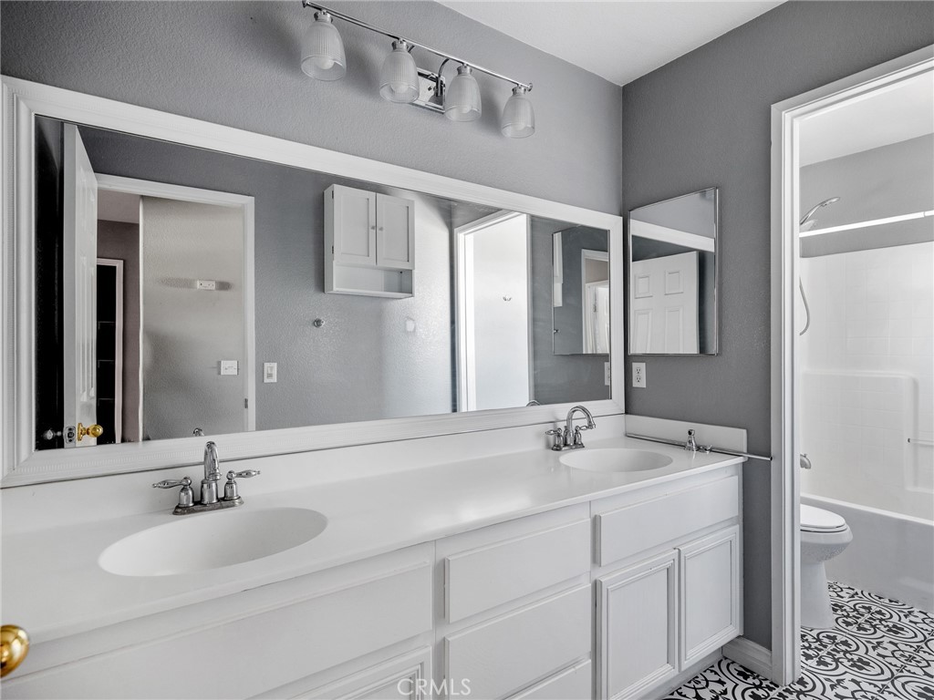 8923 Azalea Springs Road Oak Hills, CA 92344 - Photo 34 of 46 Third Bath Upstairs with Full Bath/Shower & Double Sinks