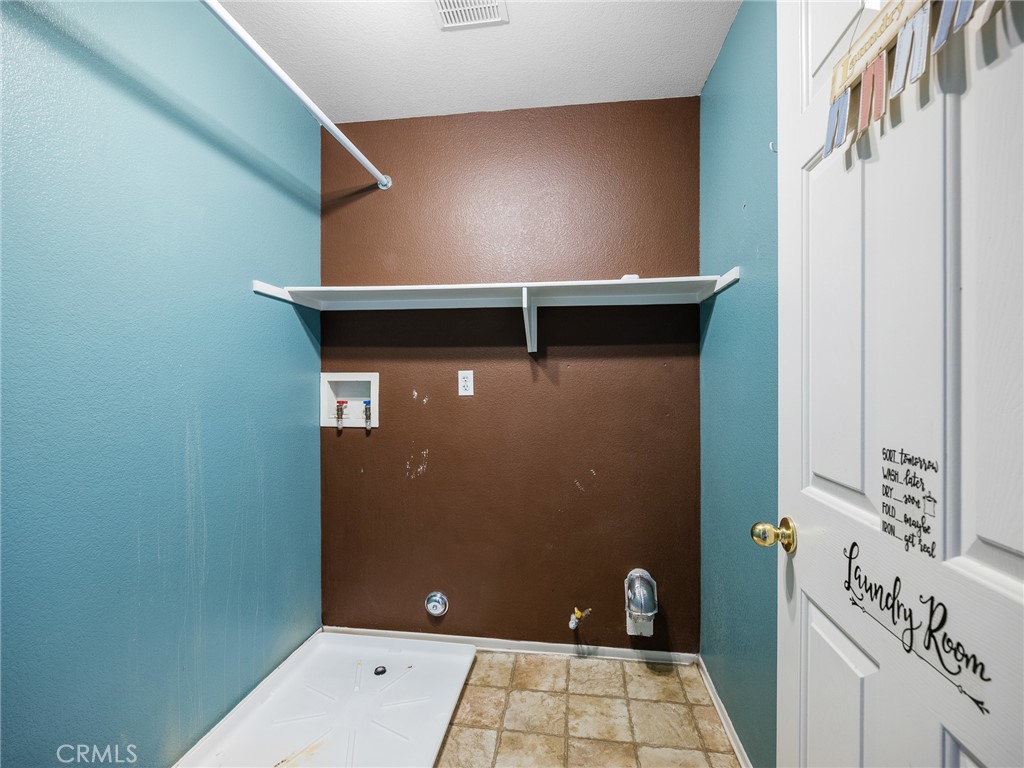 8923 Azalea Springs Road Oak Hills, CA 92344 - Photo 37 of 46 Laundry Room Upstairs