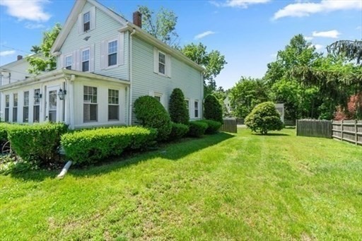 83 Mechanic Street Canton, MA 02021 - Photo 1 of 1 a front view of a house with garden