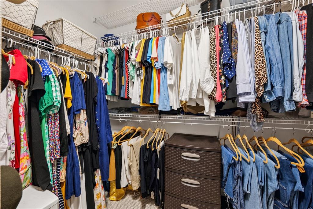 13049 Thoroughbred Drive Dade City, FL 33525 - Photo 22 of 52 a view of walk in closet with clothes