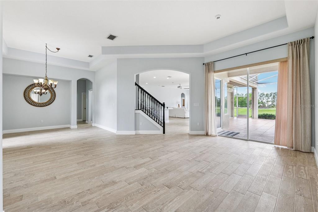 13049 Thoroughbred Drive Dade City, FL 33525 - Photo 9 of 52 a view of an empty room with a window