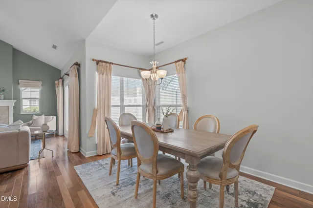 a kitchen with a sink stove and refrigerator