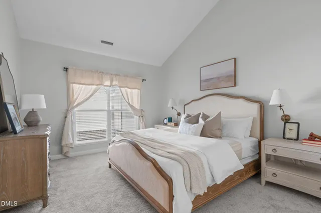 a kitchen with furniture wooden floor dining table and chairs
