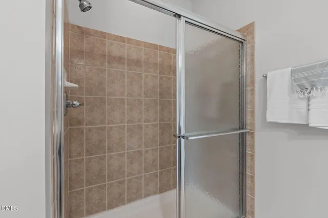 a living room with kitchen island furniture and a wooden floor