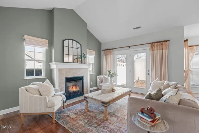 a workspace room with furniture and windows