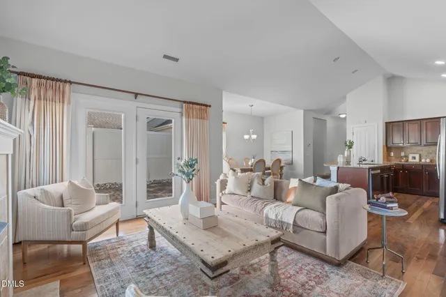an aerial view of a house with yard swimming pool and outdoor seating