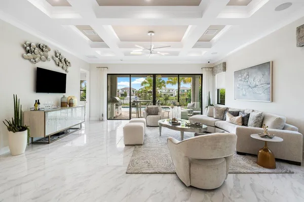 a living room with fireplace furniture and a flat screen tv