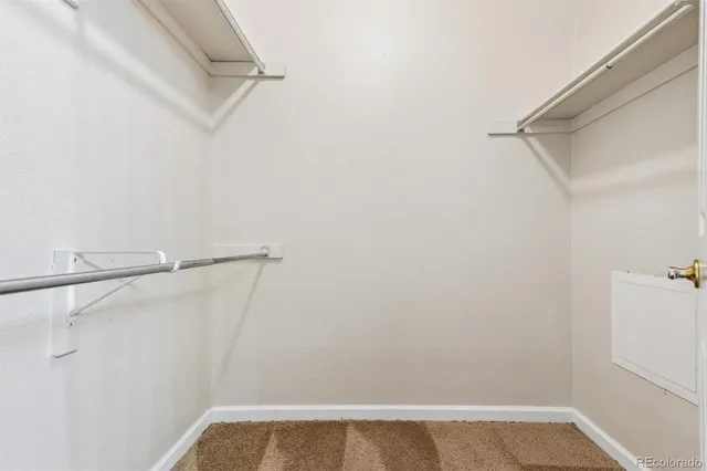 a view of small space with racks on the wall