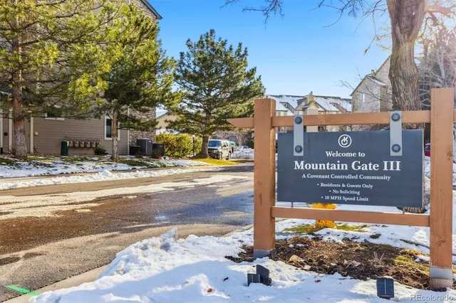 a front view of house with yard and outdoor seating