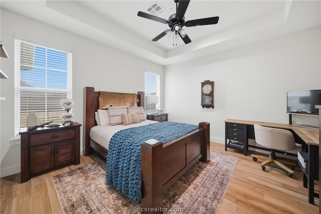 3520 Fairhope Way Bryan, TX 77808 - Photo 22 of 39 a bedroom with a bed and a desk