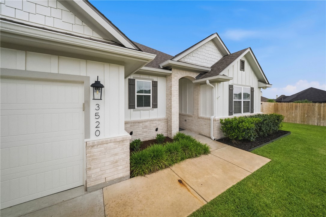 3520 Fairhope Way Bryan, TX 77808 - Photo 3 of 39 a front view of a house with a yard