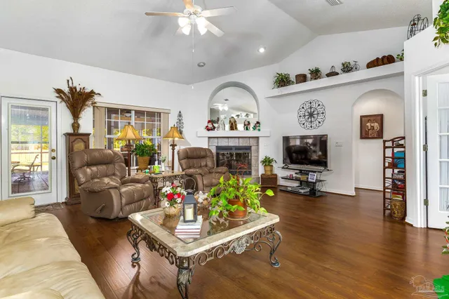 a large white house with a large pool