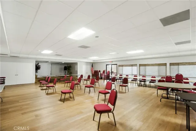 a living room with lots of furniture and a gym machine