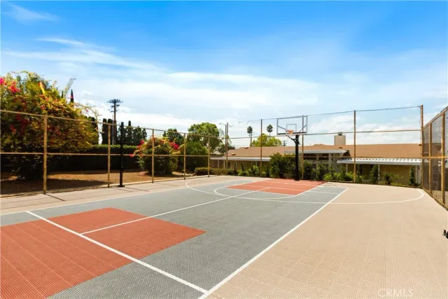 a view of a tennis court with basket ball court
