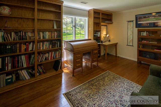 1762 Hidden Spring Road West Jefferson, NC 28694 - Photo 11 of 46 a living room with furniture and a book shelf