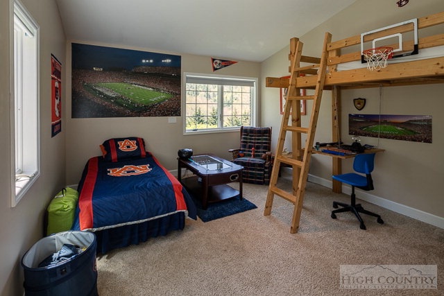 1762 Hidden Spring Road West Jefferson, NC 28694 - Photo 20 of 46 a bedroom with a bed and a window
