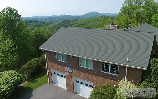 1762 Hidden Spring Road West Jefferson, NC 28694 - Photo 39 of 46 front view of house with a yard