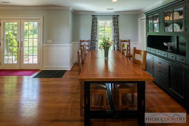 1762 Hidden Spring Road West Jefferson, NC 28694 - Photo 42 of 46 a view of a dining room with furniture and a window