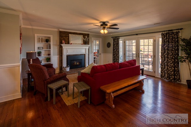 1762 Hidden Spring Road West Jefferson, NC 28694 - Photo 43 of 46 a living room with furniture and a fireplace