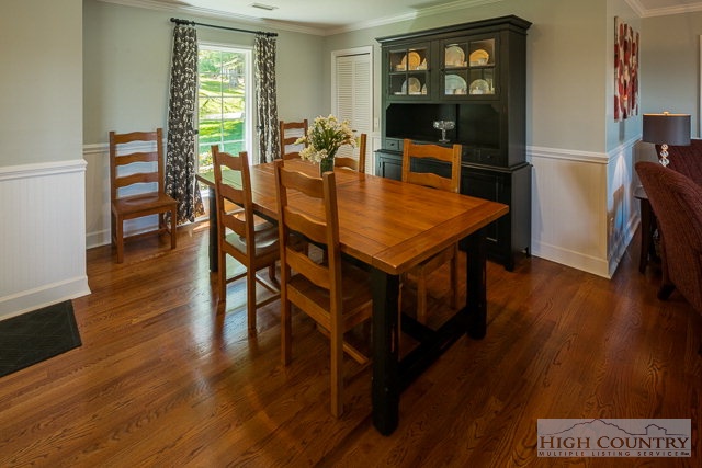 1762 Hidden Spring Road West Jefferson, NC 28694 - Photo 45 of 46 a dining room with furniture window and wooden floor