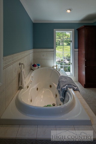 1762 Hidden Spring Road West Jefferson, NC 28694 - Photo 8 of 46 a bathroom with a bathtub