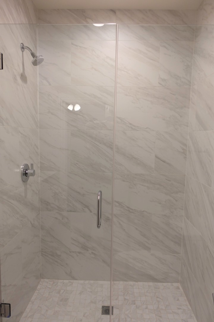 809 North Franklin Street, Unit 2F Chicago, IL 60610 - Photo 13 of 14 a bathroom with a shower