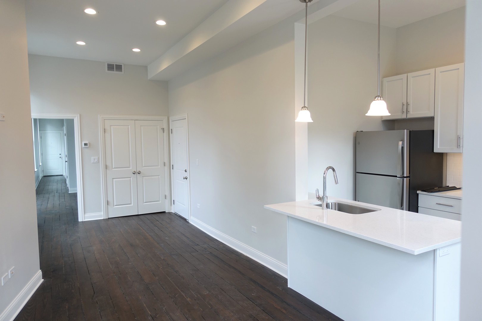 809 North Franklin Street, Unit 2F Chicago, IL 60610 - Photo 5 of 14 a bathroom with a sink and a mirror