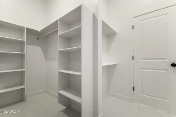 a view of an empty walk in closet