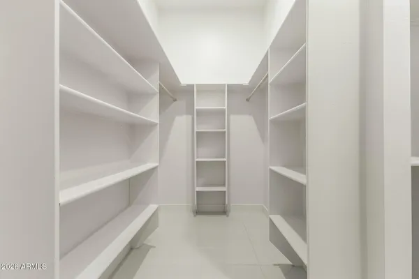a view of an empty walk in closet