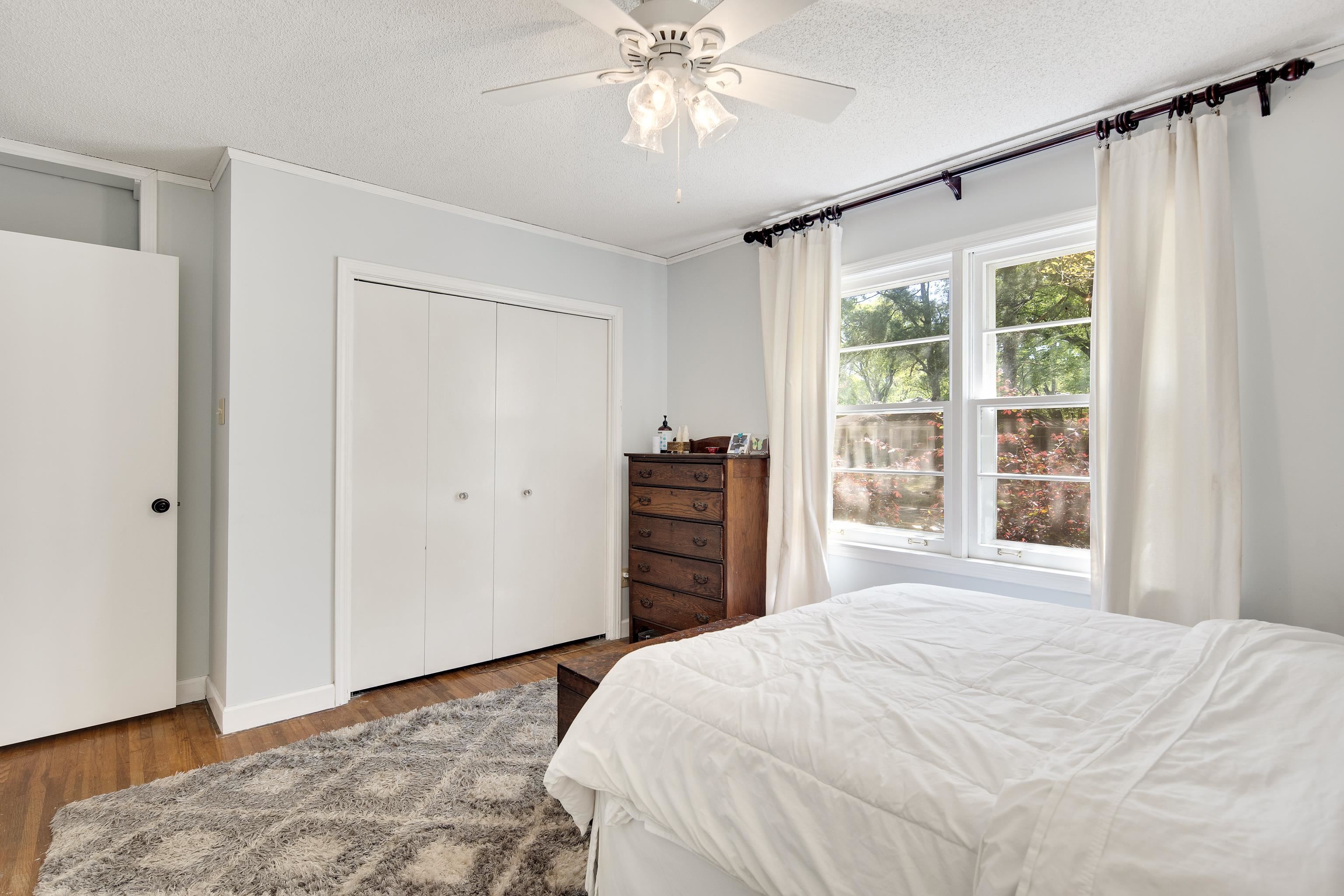 4566 Amboy Road Memphis, TN 38117 - Photo 20 of 29 a bedroom with a large bed and a window
