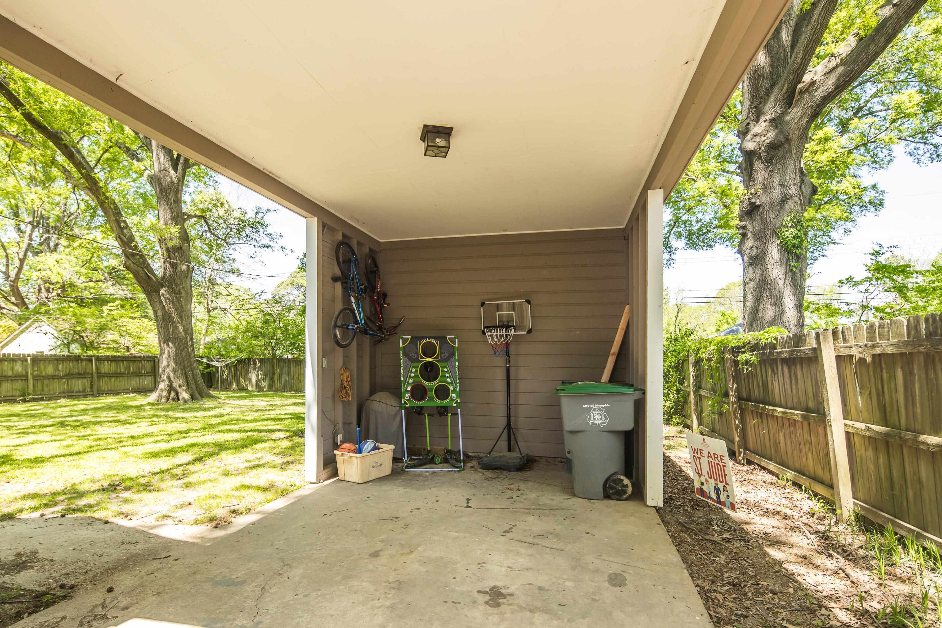 4566 Amboy Road Memphis, TN 38117 - Photo 28 of 29 a view of a porch with chairs and floor to ceiling window